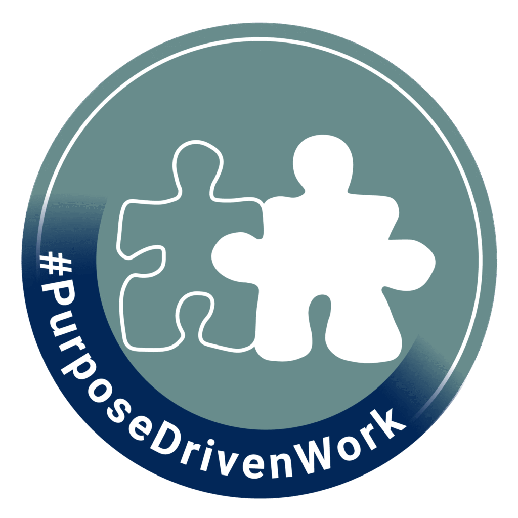White puzzle piece figure icon with #PurposeDrivenWork text, representing purpose-driven sustainable careers at DuurzameJobs.